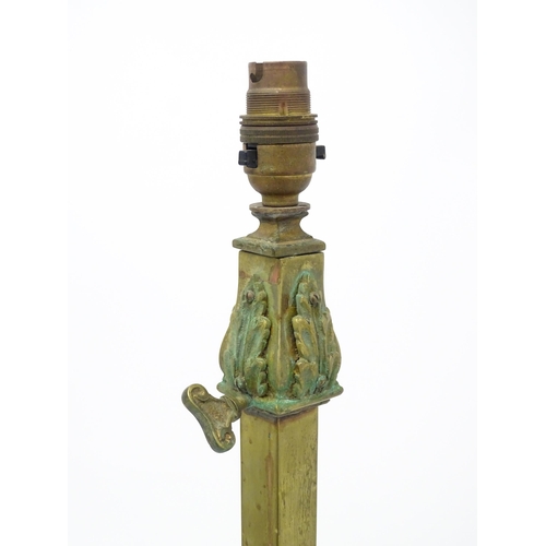 1554 - A large 20thC table lamp of squared column form on stepped base with acanthus detail. Approx. 23