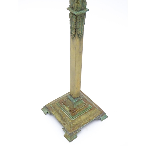 1554 - A large 20thC table lamp of squared column form on stepped base with acanthus detail. Approx. 23