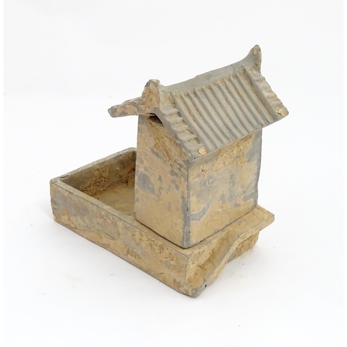 1033 - A Chinese Han dynasty pottery model of a pig sty with hut, a model of a boar and a model of a duck. ... 