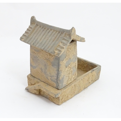 1033 - A Chinese Han dynasty pottery model of a pig sty with hut, a model of a boar and a model of a duck. ... 