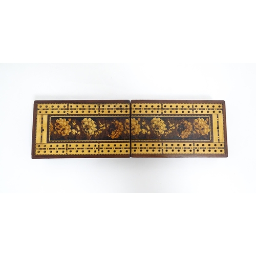 1064 - A 19thC Tunbridge ware travelling / folding cribbage board with floral and foliate decoration. Toget... 