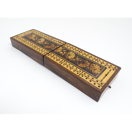 1064 - A 19thC Tunbridge ware travelling / folding cribbage board with floral and foliate decoration. Toget... 