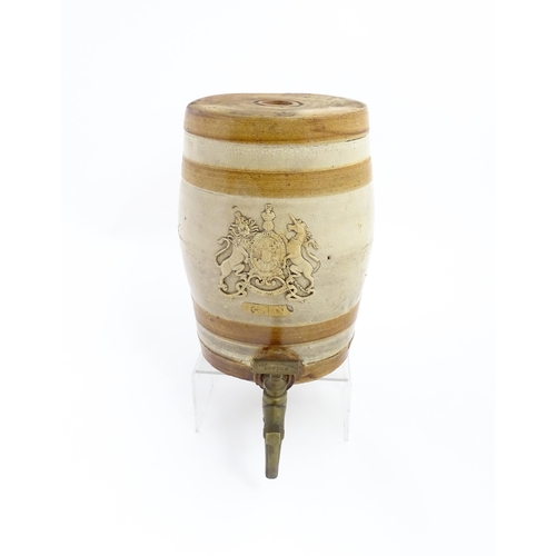 1312 - A 19thC stoneware Gin barrel bearing the coat of arms of the United Kingdom and labelled Gin under. ... 