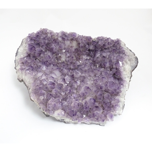 1329 - Natural History / Geology Interest: A very large amethyst crystal geode. Approx. 24