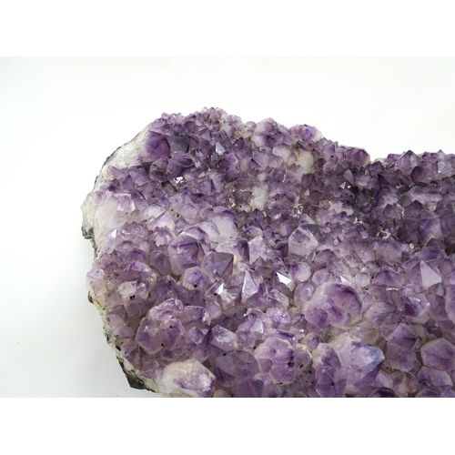 1329 - Natural History / Geology Interest: A very large amethyst crystal geode. Approx. 24