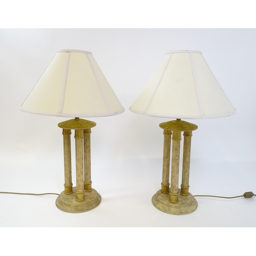 1537 - A pair of table lamps with three column detail. Approx. 31