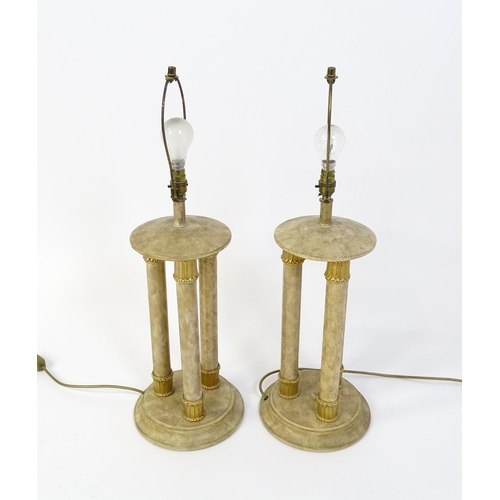 1537 - A pair of table lamps with three column detail. Approx. 31