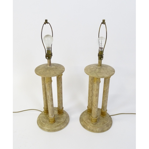 1537 - A pair of table lamps with three column detail. Approx. 31