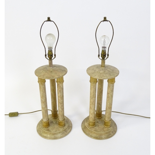 1537 - A pair of table lamps with three column detail. Approx. 31