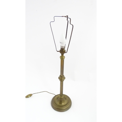 1545 - A 20thC brass table lamp. Approx. 27 1/2