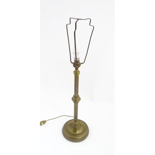 1545 - A 20thC brass table lamp. Approx. 27 1/2