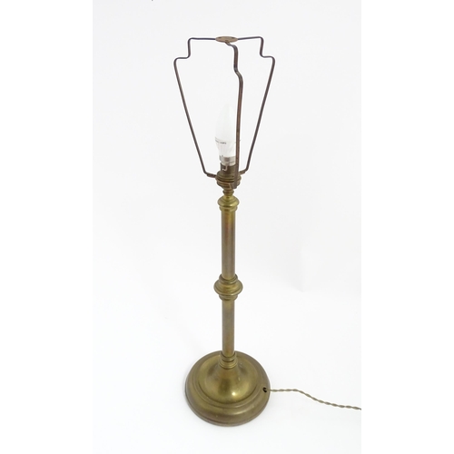 1545 - A 20thC brass table lamp. Approx. 27 1/2