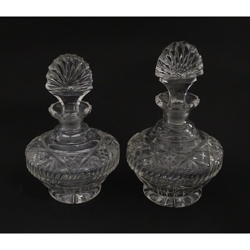 158 - Two cut glass scent / perfume bottles. Approx. 8 1/2