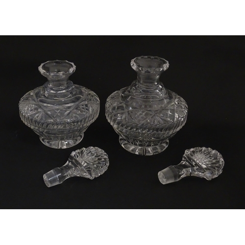 158 - Two cut glass scent / perfume bottles. Approx. 8 1/2