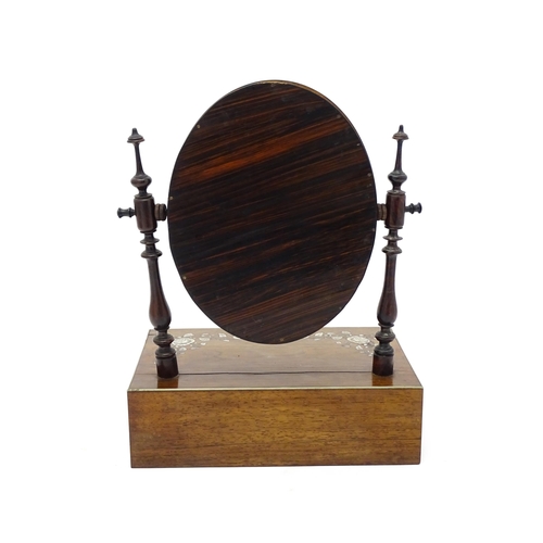 1736 - A 20thC rosewood dressing mirror with two turned upright supports above an inlaid top and having a s... 