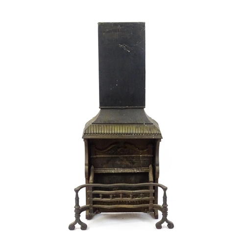 1746A - A mid 20thC cast iron open fireplace, comprising one-piece fire box, back, grate and smoke shelf wit... 