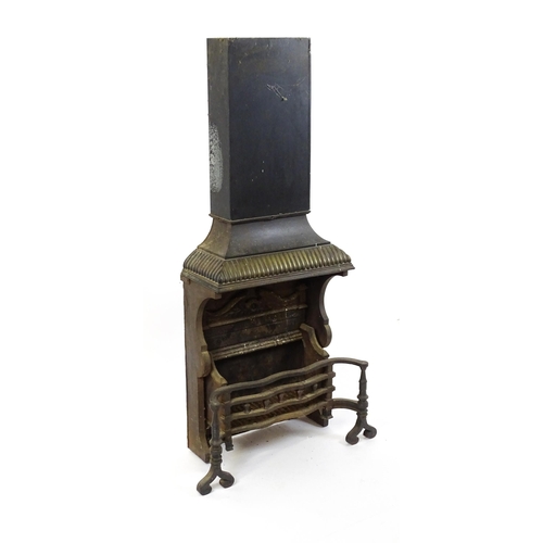 1746A - A mid 20thC cast iron open fireplace, comprising one-piece fire box, back, grate and smoke shelf wit... 