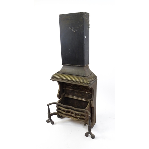 1746A - A mid 20thC cast iron open fireplace, comprising one-piece fire box, back, grate and smoke shelf wit... 