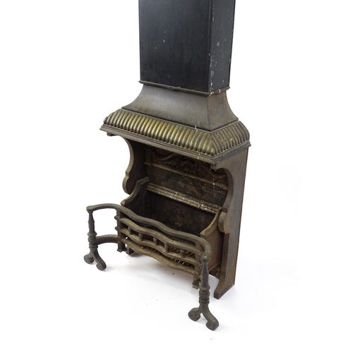 1746A - A mid 20thC cast iron open fireplace, comprising one-piece fire box, back, grate and smoke shelf wit... 