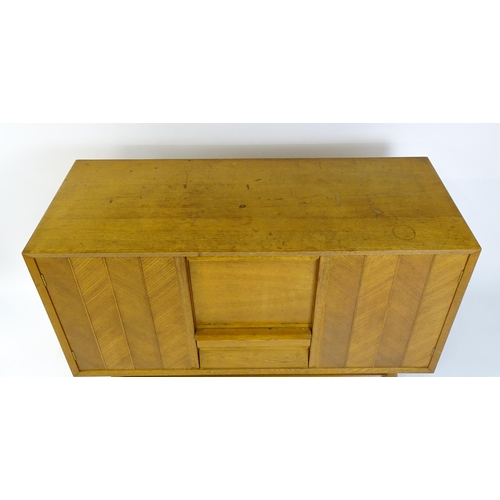 1751 - A mid-century Everest oak sideboard, no. 1003C for Maples. Maples label to drawer. Approx. 35