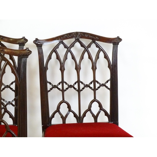 1753 - A set of four early 20thC mahogany Chinese Chippendale style Gothic side chairs, with lancet style t... 