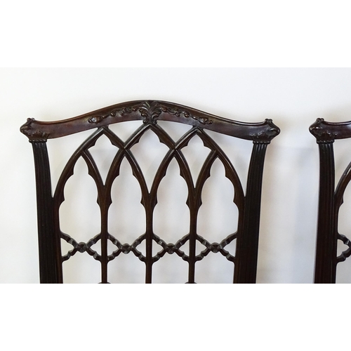 1753 - A set of four early 20thC mahogany Chinese Chippendale style Gothic side chairs, with lancet style t... 