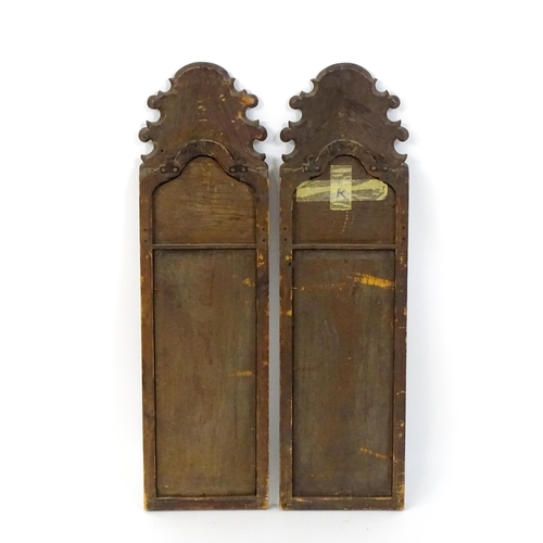 1755 - A pair of Georgian style walnut wall mirrors with shaped tops, applied shell motifs, heavily moulded... 