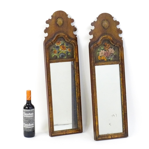 1755 - A pair of Georgian style walnut wall mirrors with shaped tops, applied shell motifs, heavily moulded... 