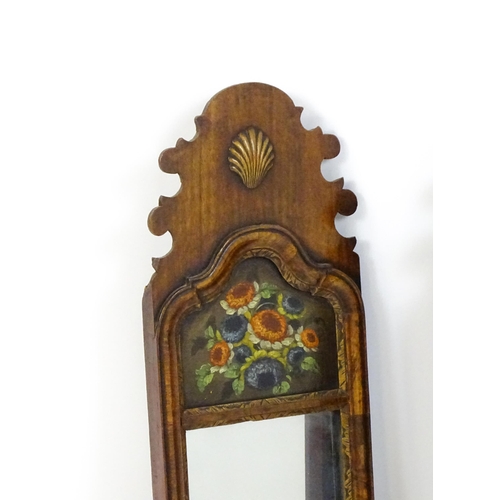 1755 - A pair of Georgian style walnut wall mirrors with shaped tops, applied shell motifs, heavily moulded... 