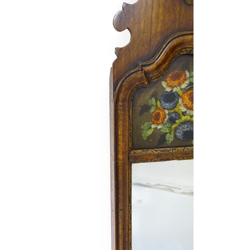 1755 - A pair of Georgian style walnut wall mirrors with shaped tops, applied shell motifs, heavily moulded... 