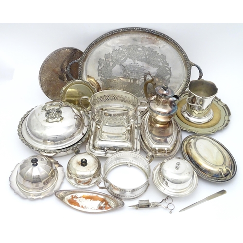 517 - A quantity of 19thC and later silver plate items to include a large twin handled tray, entree dishes... 