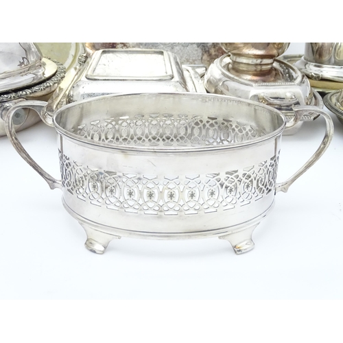 517 - A quantity of 19thC and later silver plate items to include a large twin handled tray, entree dishes... 