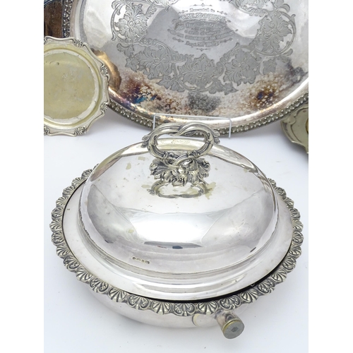 517 - A quantity of 19thC and later silver plate items to include a large twin handled tray, entree dishes... 