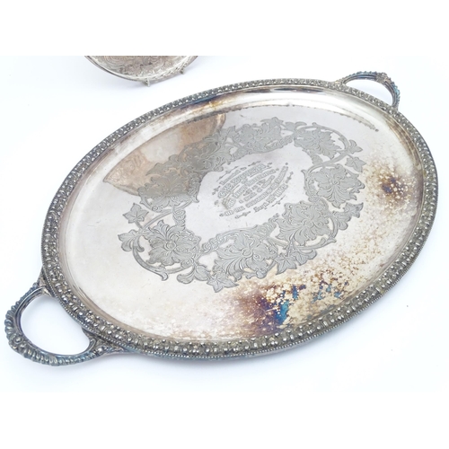 517 - A quantity of 19thC and later silver plate items to include a large twin handled tray, entree dishes... 