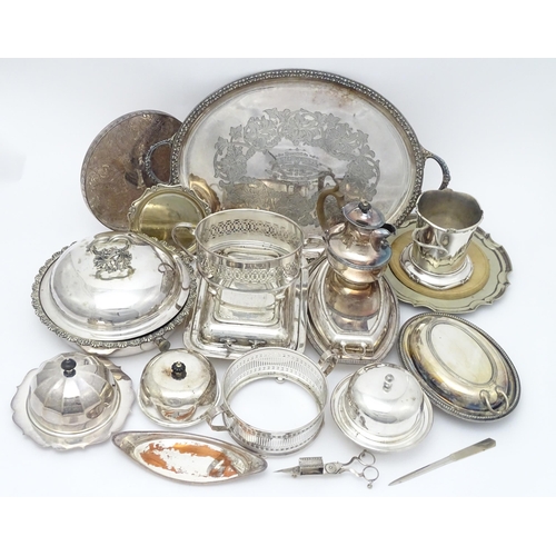 517 - A quantity of 19thC and later silver plate items to include a large twin handled tray, entree dishes... 