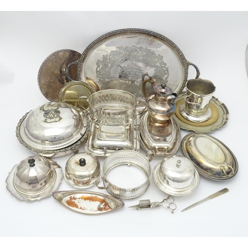 517 - A quantity of 19thC and later silver plate items to include a large twin handled tray, entree dishes... 