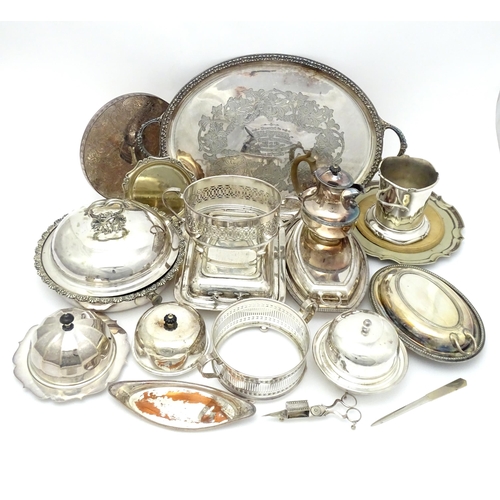 517 - A quantity of 19thC and later silver plate items to include a large twin handled tray, entree dishes... 