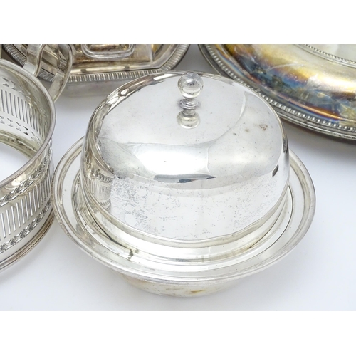 517 - A quantity of 19thC and later silver plate items to include a large twin handled tray, entree dishes... 