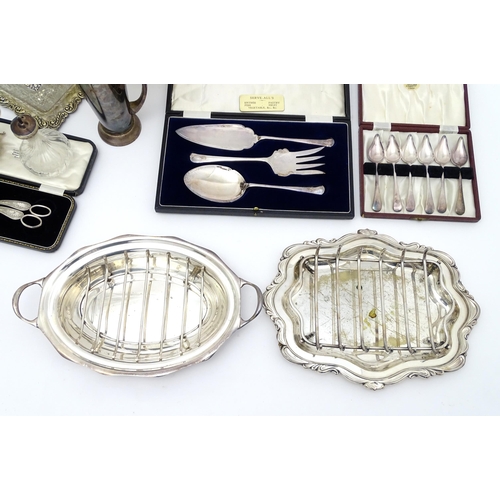 518 - A quantity of silver plate items to include cake basket, bottle coasters, asparagus dishes, butter d... 