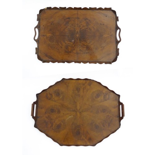 1300 - A 19thC yew wood tray of rectangular form with shaped gallery. Together with another of octagonal fo... 