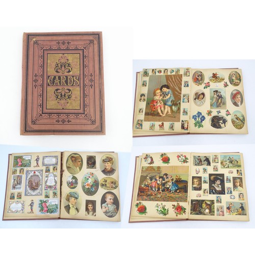 962 - A Victorian scrapbook to include various prints, engravings, greetings cards, love tokens, floral an... 