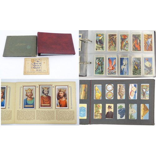 964 - A quantity of tea and cigarette cards within three albums, examples from various series including Jo... 