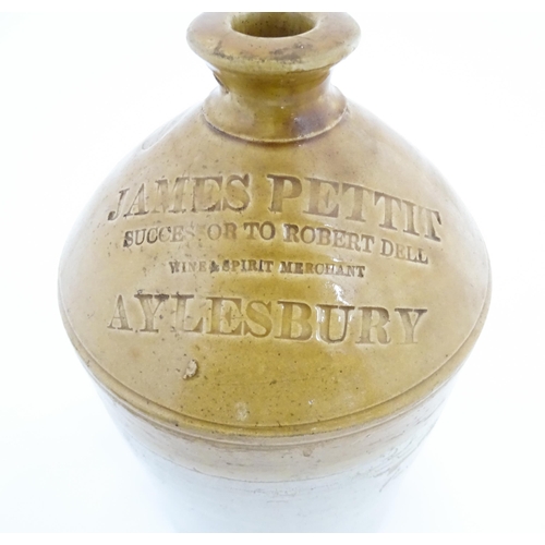 78 - An early 20thC two tone stoneware flagon marked James Pettit, Successor to Robert Dell Wine & Spirit... 