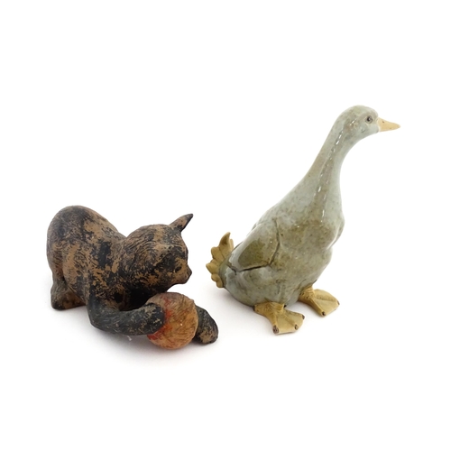 113 - A Chinese model of a duck with a celadon style glaze. Together with a Bretby model of a kitten / cat... 