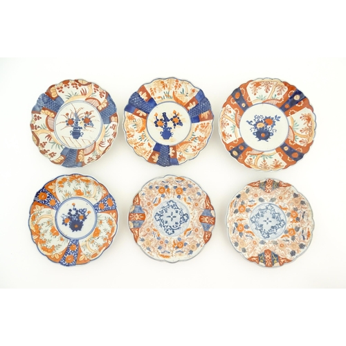 129 - Six assorted Japanese plates with scalloped edges decorated in the Imari palette with flowers and fo... 