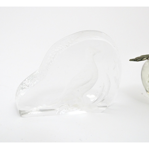 131 - A quantity of assorted glass paperweights to include examples modelled as birds etc. makers includin... 