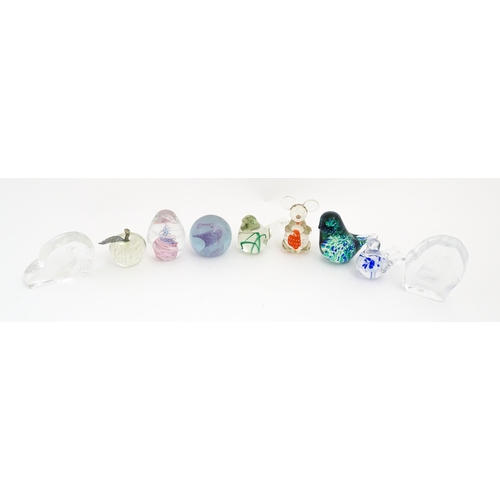 131 - A quantity of assorted glass paperweights to include examples modelled as birds etc. makers includin... 