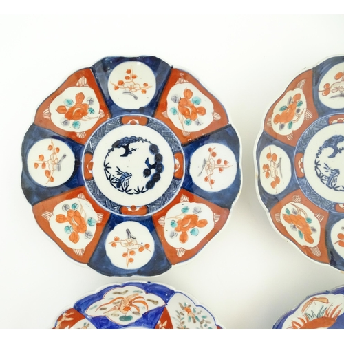 133 - Six assorted Japanese plates with scalloped edges decorated in the Imari palette with flowers, folia... 