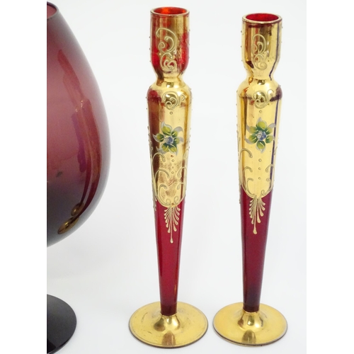 301 - A quantity of assorted glassware to include pedestal blue glass vases, candlesticks, decanters, pede... 