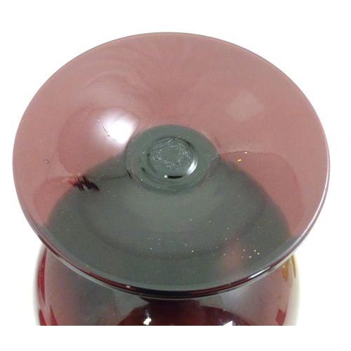 301 - A quantity of assorted glassware to include pedestal blue glass vases, candlesticks, decanters, pede... 